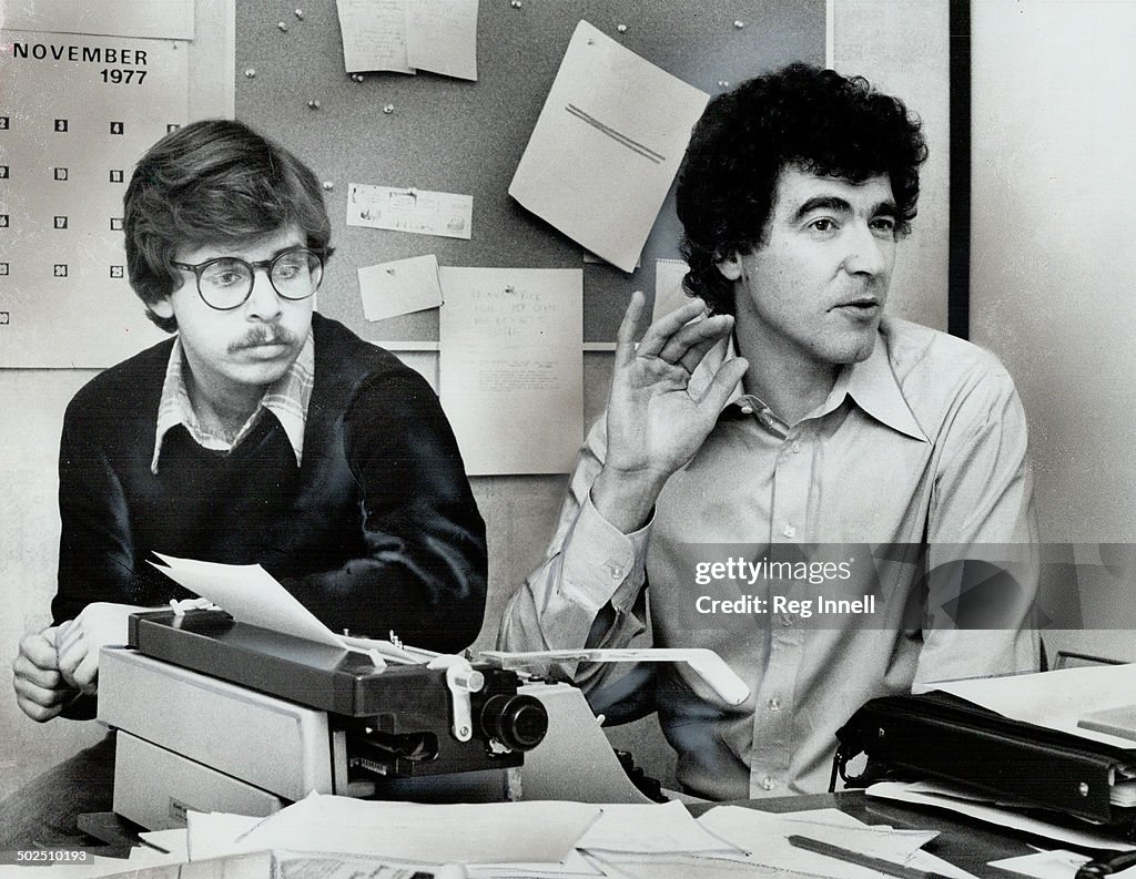 Rick Moranis (left) and Ken Finkleman; at work on the script of a pilot show for a TV comedy series;