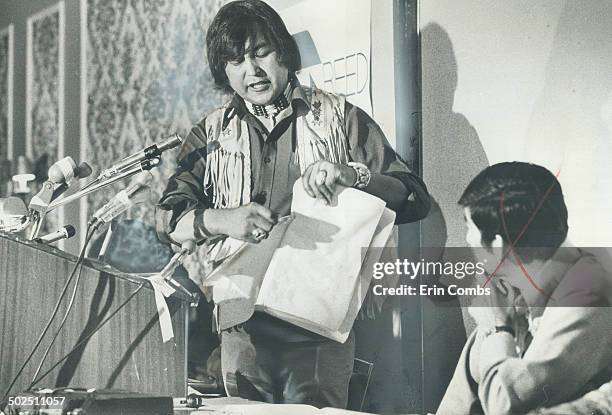 Chief Andrew Rickard tears up copy of treaty in symbolic protest against expansion of logging by Reed Paper in northwestern Ontario. The company...