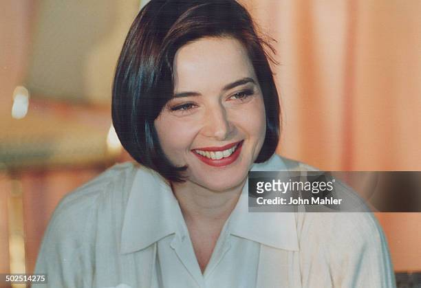 Actress and model Isabella Rossellini; from top; in Tresor fragrance ad for Lancome; dressing down in Wild at Heart; at a press breakfast in Toronto...