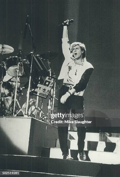 Video stars: Simon Le Bon; the male-model-like; good-looking leader of the male-model-like; good-looking pop group Duran Duran in action. Theband has...