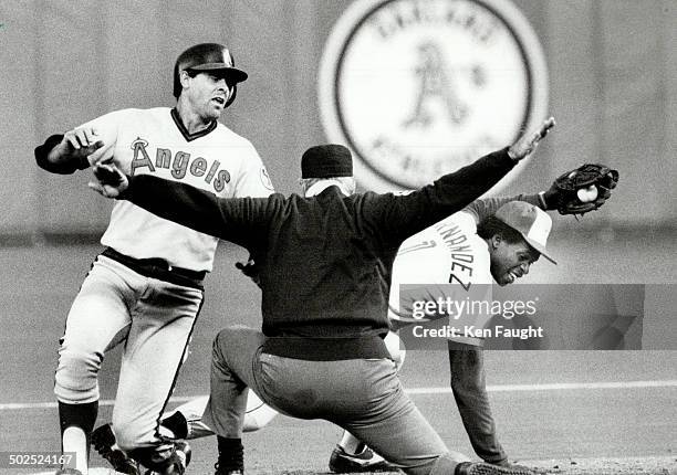 It was close: Catcher Bob Boone is called safe by umpire Jim McKean at second base during fourth-inning action in game at Exhibition Stadium last...