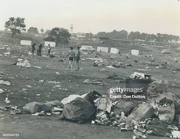 Piles of garbage clutter up Mosport's 30 acres after the Strawberry Fields rock festival ended yesterday. But almost 1;000 young people were still...