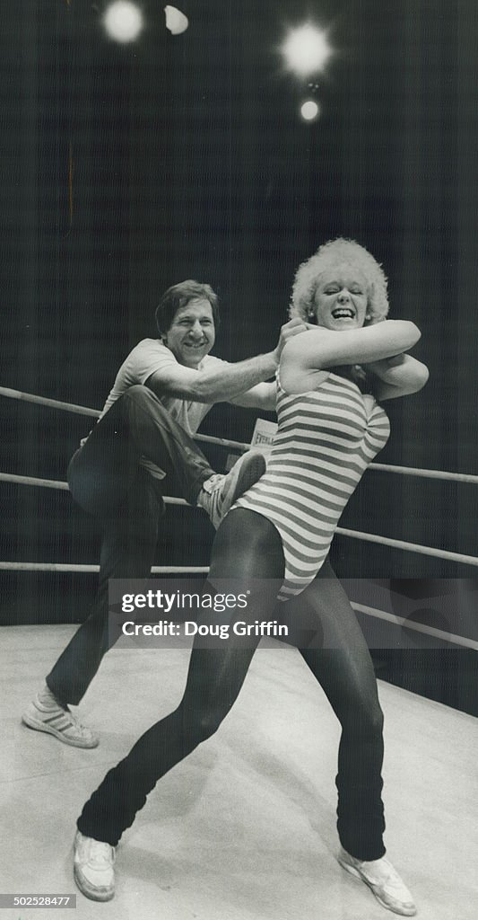 Lester Howard Director Howard Lester gets Lelania Marrell ready for trying title ...