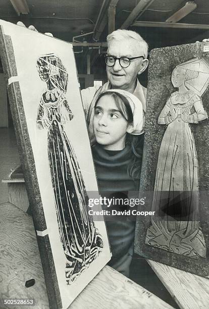 Master passes on his Art. Instructor Harry inspects the work of Maria Dutra; 11; one of 35 Grade 6 pupils from St. Veronica School who visited the...