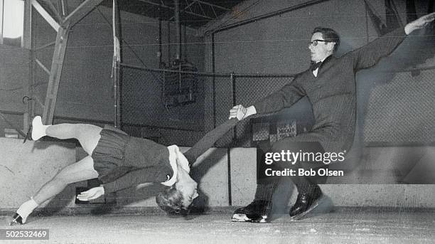 Chris and Alexis Shields demonstrate one of pairs Skating's classic manoeuvres--The Death spiral; Brother and sister; now in training for upcoming...