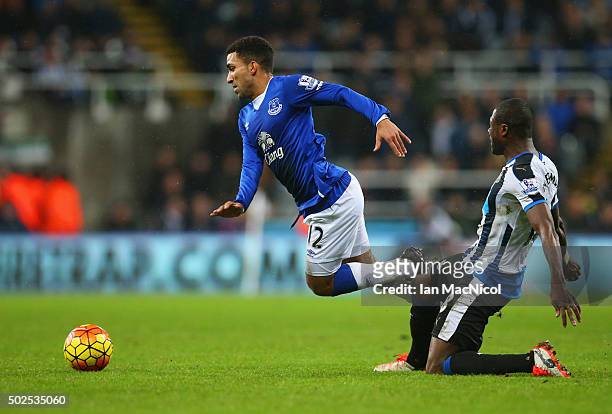 Aaron Lennon of Everton is tripped by Chancel Mbemba of Newcastle United during the Barclays Premier League match between Newcastle United and...