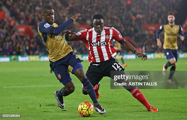 Arsenal's Costa Rican striker Joel Campbell vies with Southampton's Kenyan midfielder Victor Wanyama during the English Premier League football match...