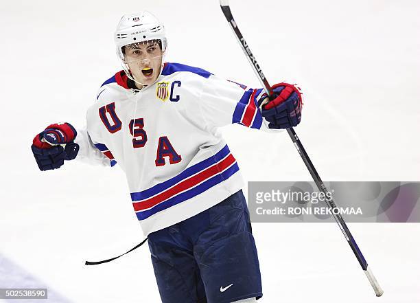 Captain Zach Werenski celebrates his 2-1 goal during the 2016 IIHF World Junior Ice Hockey Championship match between USA and Canada in Helsinki,...