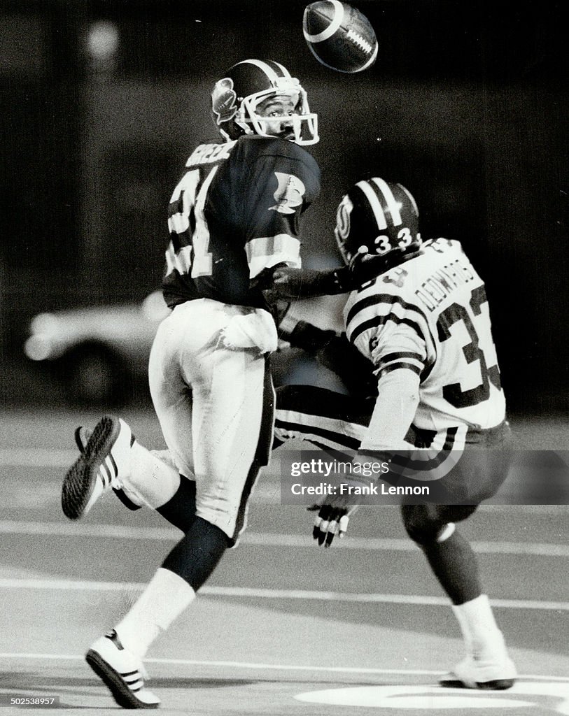 Argos' Marcellus Greene; left; fights for ball with Roughriders' Dwight Edwards; a former Argo; and 