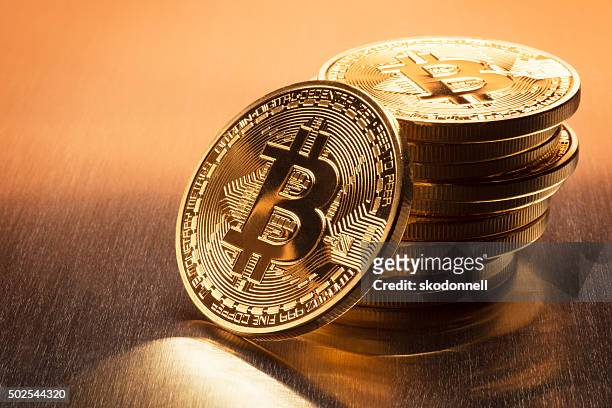 bitcoin stack - bitcoin stock pictures, royalty-free photos & images