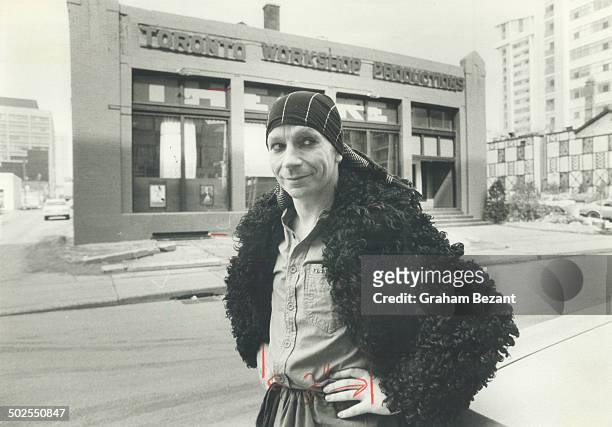 Actor Lindsay Kemp poses in front of Toronto Workshop Productions.