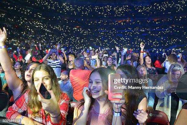 Fans performs during the 2015 Y100 Jingle Ball at BB&T Center on December 18, 2015 in Sunrise, Florida.