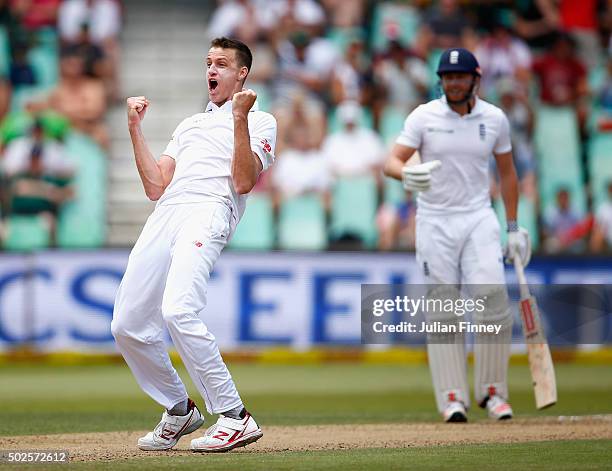 Morne Morkel of South Africa celebrates taking the wicket of Chris Woakes of England during day two of the 1st Test between South Africa and England...