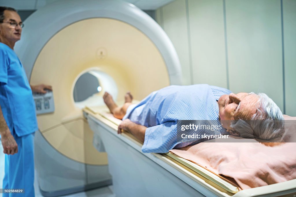 Senior receiving an MRI Scan.