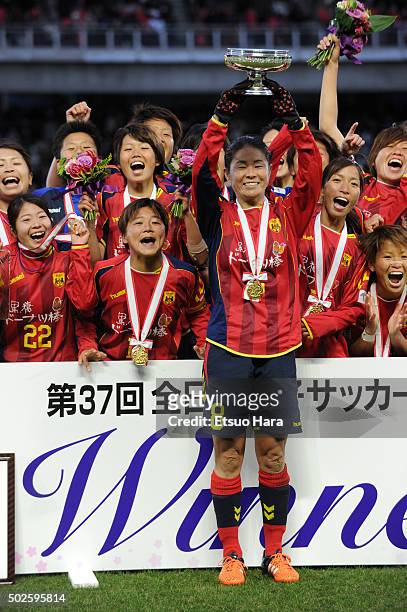 Homare Sawa of INAC Kobe Leonessa celebrates with the trophy during the 37th Empress's Cup All Japan Women's Championship final match between INAC...