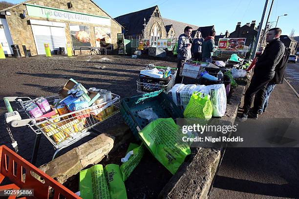 The local co-op rovide esentials for residents after flooding on December 27, 2015 in Mytholmroyd, England. Heavy rain has caused more flooding in...