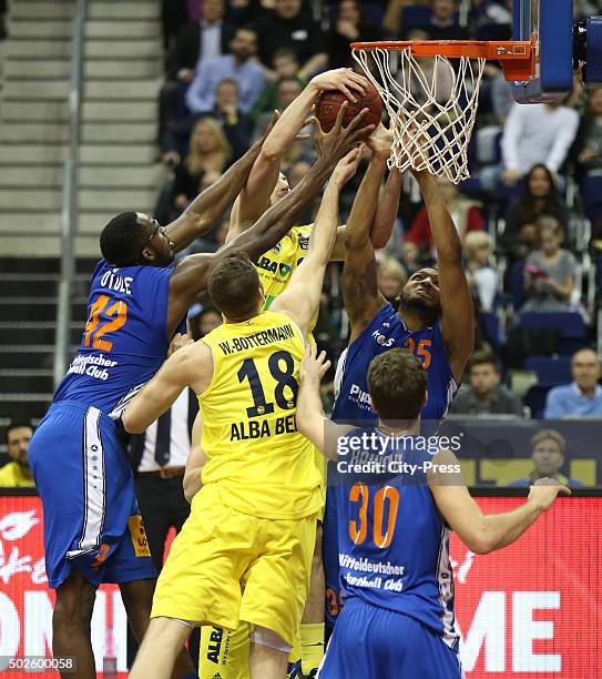 Chris Otule of Mitteldeutscher BC, Jonas Wohlfarth-Bottermann of ALBA Berlin, Oliver Clay and Stephan Haukohl of Mitteldeutscher BC during the game...