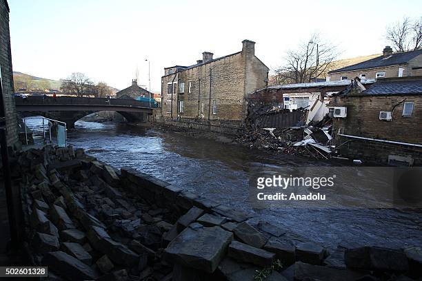 House on the bank of the river Calder in Mytholmroyd is collapsed in the water in York, England on December 27, 2015. Heavy rain caused the river to...