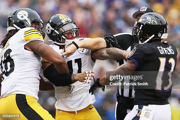 Chris Givens of the Baltimore Ravens and Antwon Blake of the Pittsburgh Steelers are separated during the first quarter at M&T Bank Stadium on...