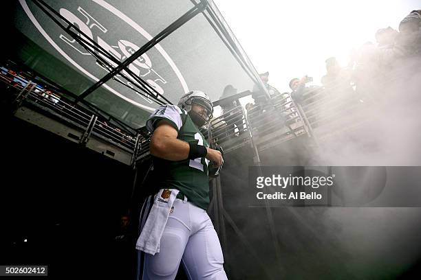 Ryan Fitzpatrick of the New York Jets prepares to take the field prior to their game against the New England Patriots at MetLife Stadium on December...