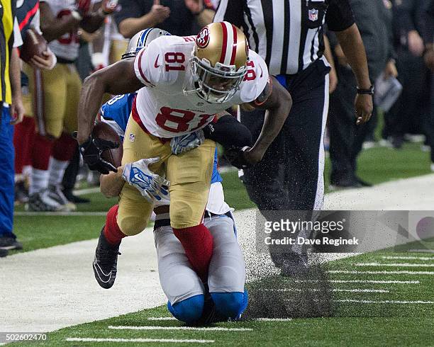 Anquan Boldin of the San Francisco 49ers tries to break the tackle by Darius Slay of the Detroit Lions in the first quarter during an NFL game at...