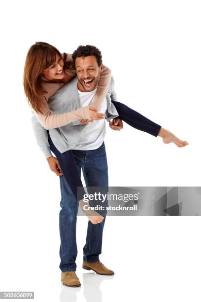 interracial couple in playful mood - couple full length stock pictures, royalty-free photos & images