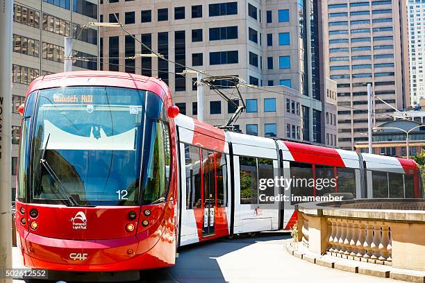 light rail train departing from central station in sydney australia - sydney light rail stock pictures, royalty-free photos & images