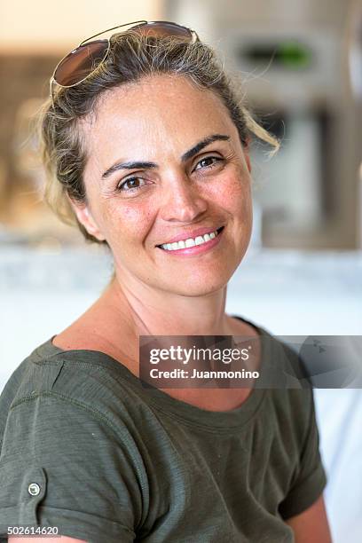 mature hispanic woman smiling - 2015 45 50 stock pictures, royalty-free photos & images