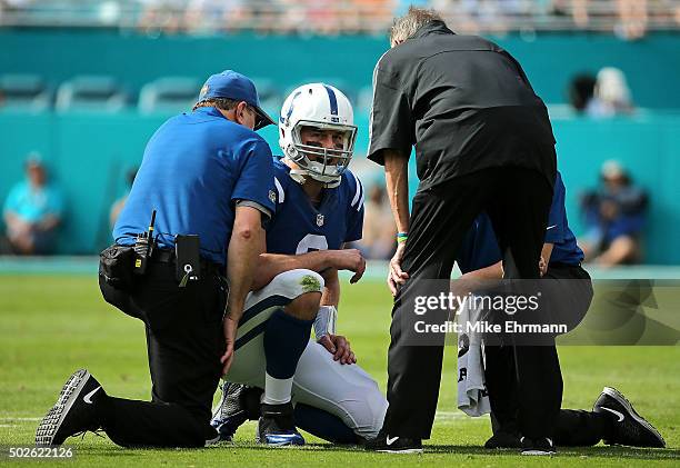 Matt Hasselbeck of the Indianapolis Colts reacts to being hurt during a game against the Miami Dolphins at Sun Life Stadium on December 27, 2015 in...