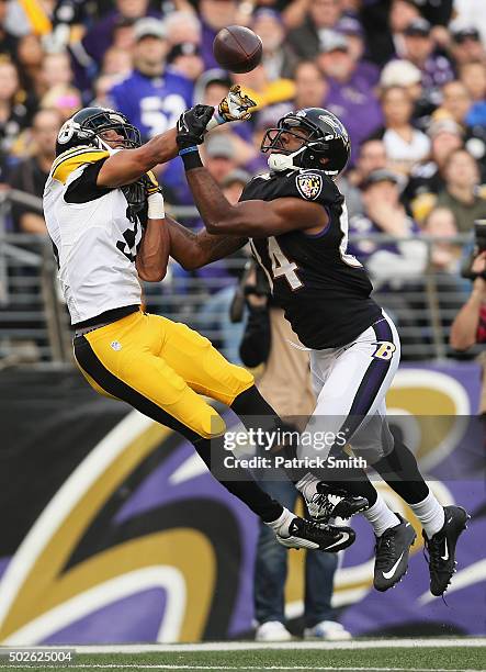 Ross Cockrell of the Pittsburgh Steelers defends Chris Matthews of the Baltimore Ravens during the fourth quarter at M&T Bank Stadium on December 27,...