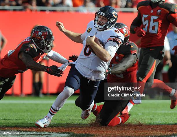Quarterback Jay Cutler of the Chicago Bears scrambles for a first down in the fourth quarter at Raymond James Stadium on December 27, 2015 in Tampa,...