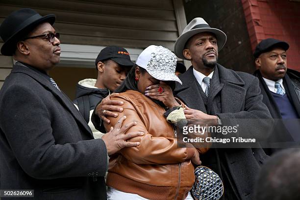 LaTarsha Jones, center, daughter of Bettie Jones, is comforted by family and friends during a press conference on Sunday, Dec. 27 in front of the...