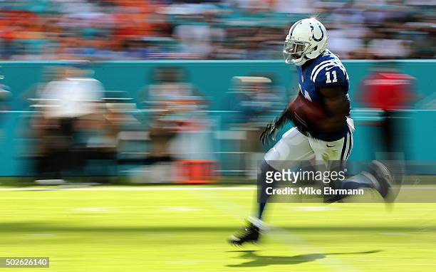 Quan Bray of the Indianapolis Colts returns a kick during a game against the Miami Dolphins at Sun Life Stadium on December 27, 2015 in Miami...