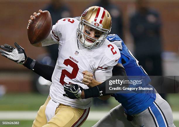 Blaine Gabbert of the San Francisco 49ers is sacked by Devin Taylor of the Detroit Lions in the third quarter at Ford Field on December 27, 2015 in...