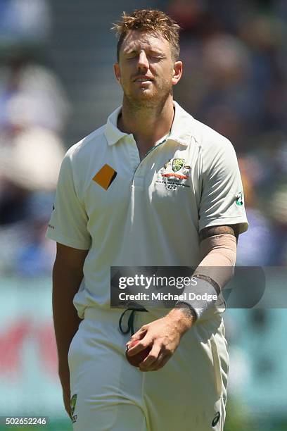 Bowler James Pattinson of Australia reacts after his dismissal of Carlos Brathwaite of the West Indies was reversed for the second time because of no...