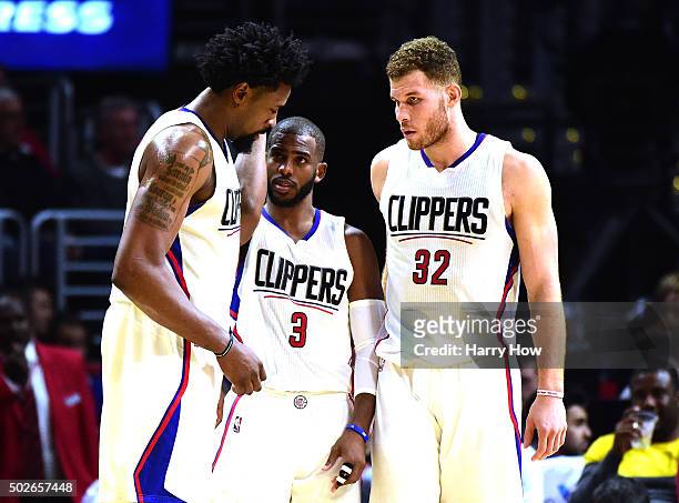 DeAndre Jordan, Chris Paul and Blake Griffin of the Los Angeles Clippers gather during the game against the Oklahoma City Thunder at Staples Center...