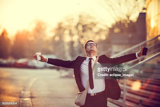 businessman smiling with arms outstretched - independence bildbanksfoton och bilder