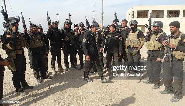 Iraqi security forces stand guard at the city center of Ramadi during an operation against DAESH in Anbar, Iraq on December 28, 2015.