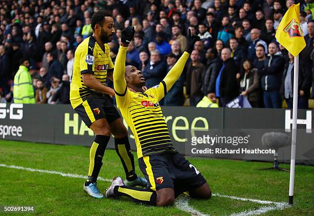 Odion Ighalo of Watford celebrates scoring his team's first goal with his team mate Ikechi Anya during the Barclays Premier League match between...