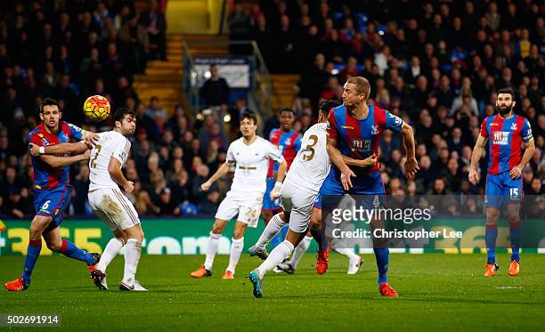 Brede Hangeland of Crystal Palace shoots at goal during the Barclays Premier League match between Crystal Palace and Swansea City at Selhurst Park on...