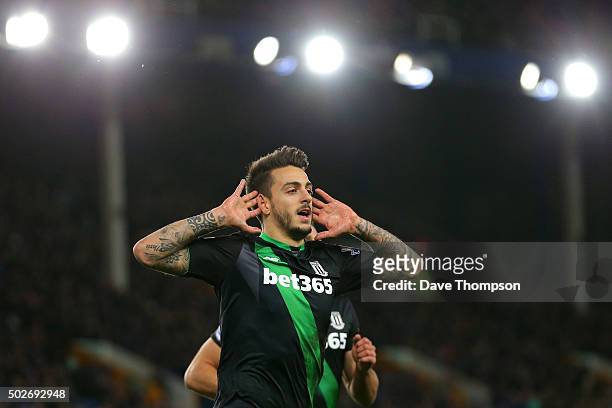 Joselu of Stoke City celebrates scoring his team's third goal during the Barclays Premier League match between Everton and Stoke City at Goodison...