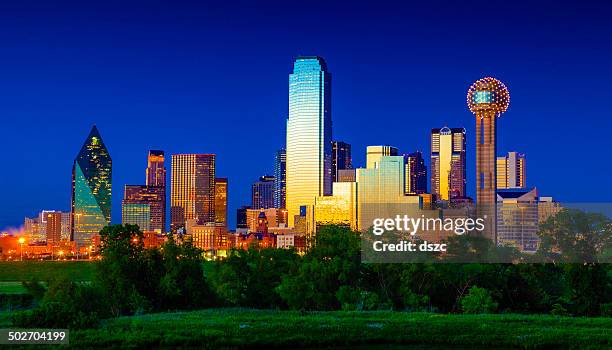 downtown dallas cityscape skyline skyscrapers glowing at dusk / twilight - dallas texas bildbanksfoton och bilder