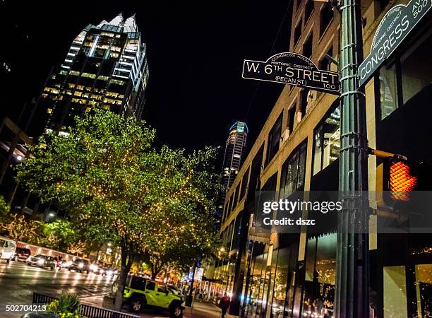 austin tx downtown night life, 6th congress street sign intersection - austin nightlife stock pictures, royalty-free photos & images