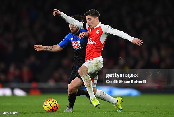 Hector Bellerin of Arsenal and Adam Smith of Bournemouth compete for the ball during the Barclays Premier League match between Arsenal and A.F.C....