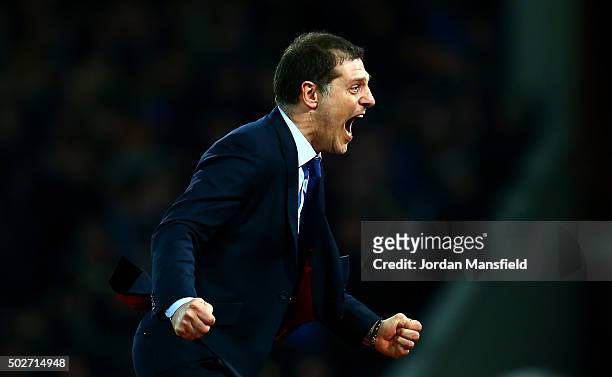 Slaven Bilic, Manager of West Ham United celebrates after Andy Carroll of West Ham United scores his side's second goal during the Barclays Premier...
