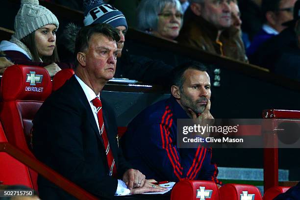 Louis van Gaal, manager of Manchester United looks on from the bench next to his assistant Ryan Giggs during the Barclays Premier League match...
