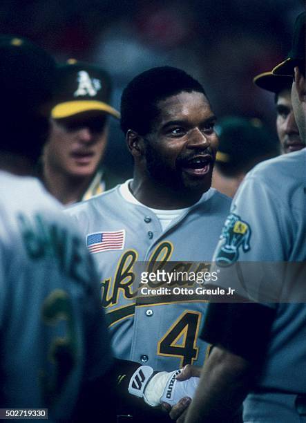 Dave Henderson of the Oakland Athletics talks to a teammate in the dugout during the 1990 World Series against the Cincinnati Reds in October, 1990...