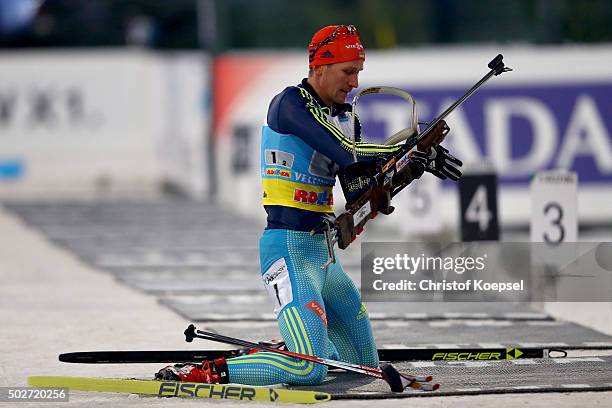 Sergei Semenov of Ukraine loads his gun during the IKK classic Biathlon World Team Challenge 2015 at Veltins-Arena on December 28, 2015 in...