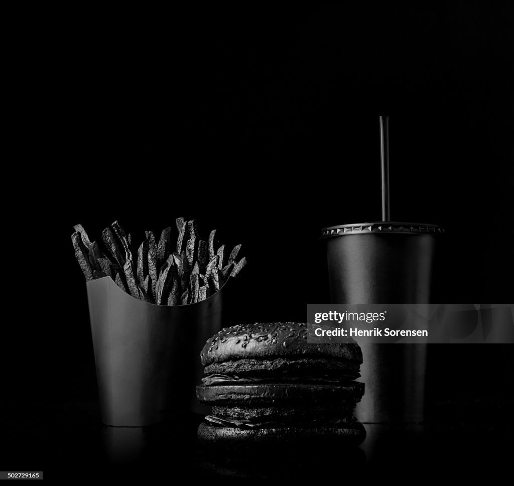 Fast food meal on black backdrop