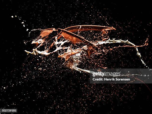 coloured liquid splash - coffee splash stock pictures, royalty-free photos & images